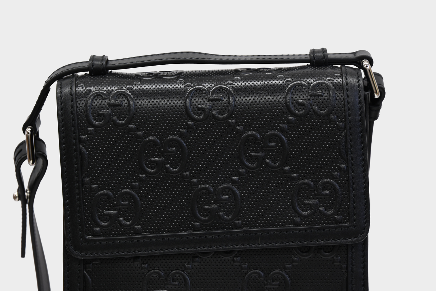 Gucci GG Embossed Perforated Leather Crossbody